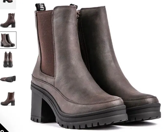 A pair of brown ankle boots with a zipper, featuring the Hibiscus Vegan Chelsea Boots design by V.GAN.