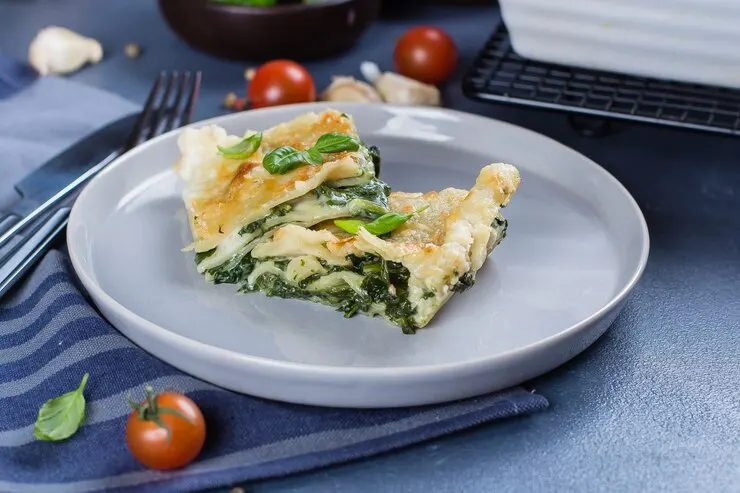 A delicious Lasagna Verde served on a plate, perfect for a romantic Valentine's Day meal.